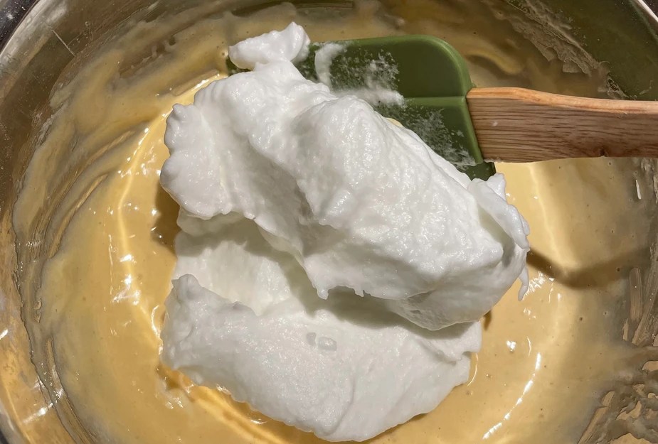 Adding meringue into the batter
