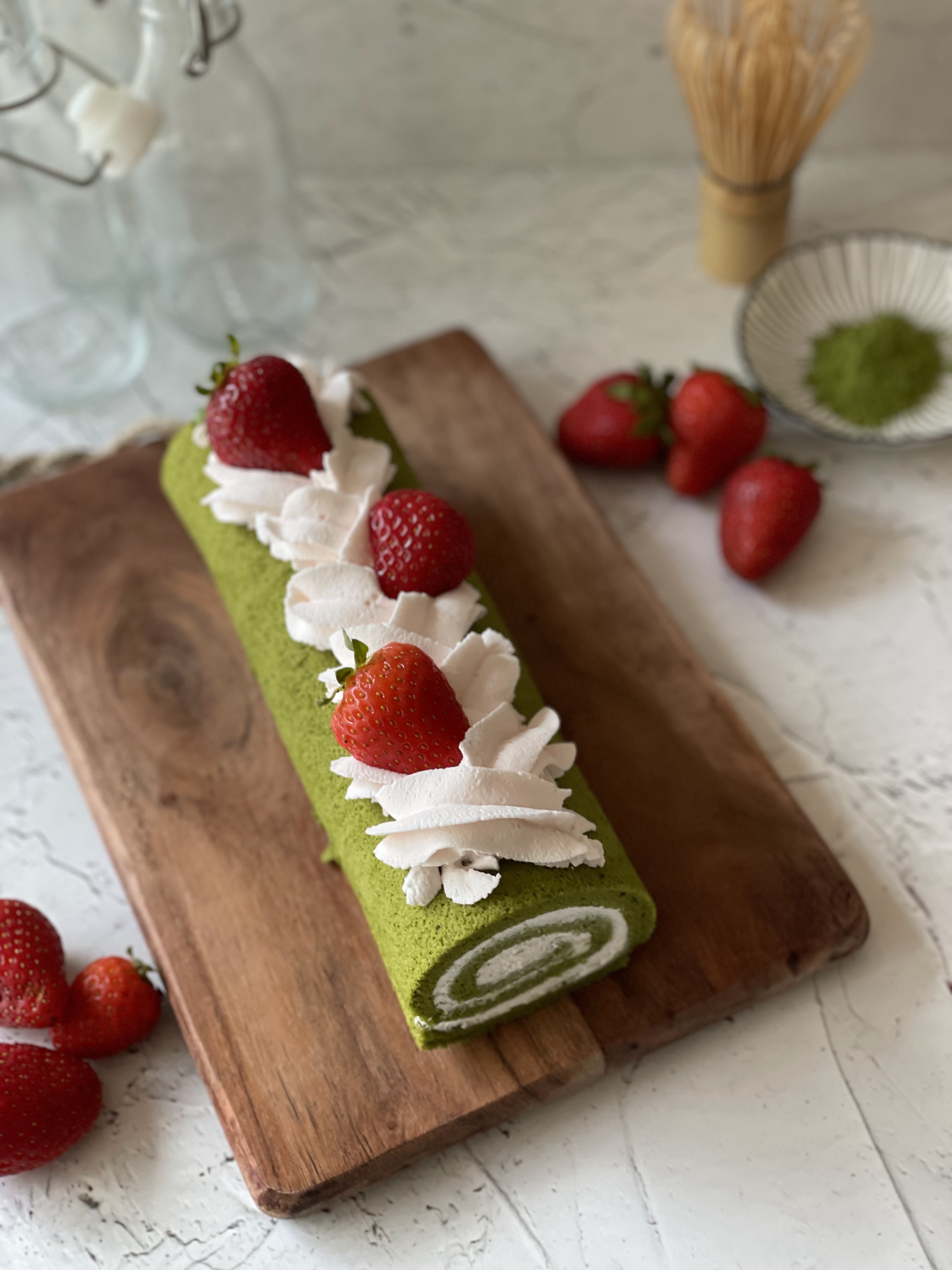 Matcha chiffon roll gluten free with strawberry whipped cream