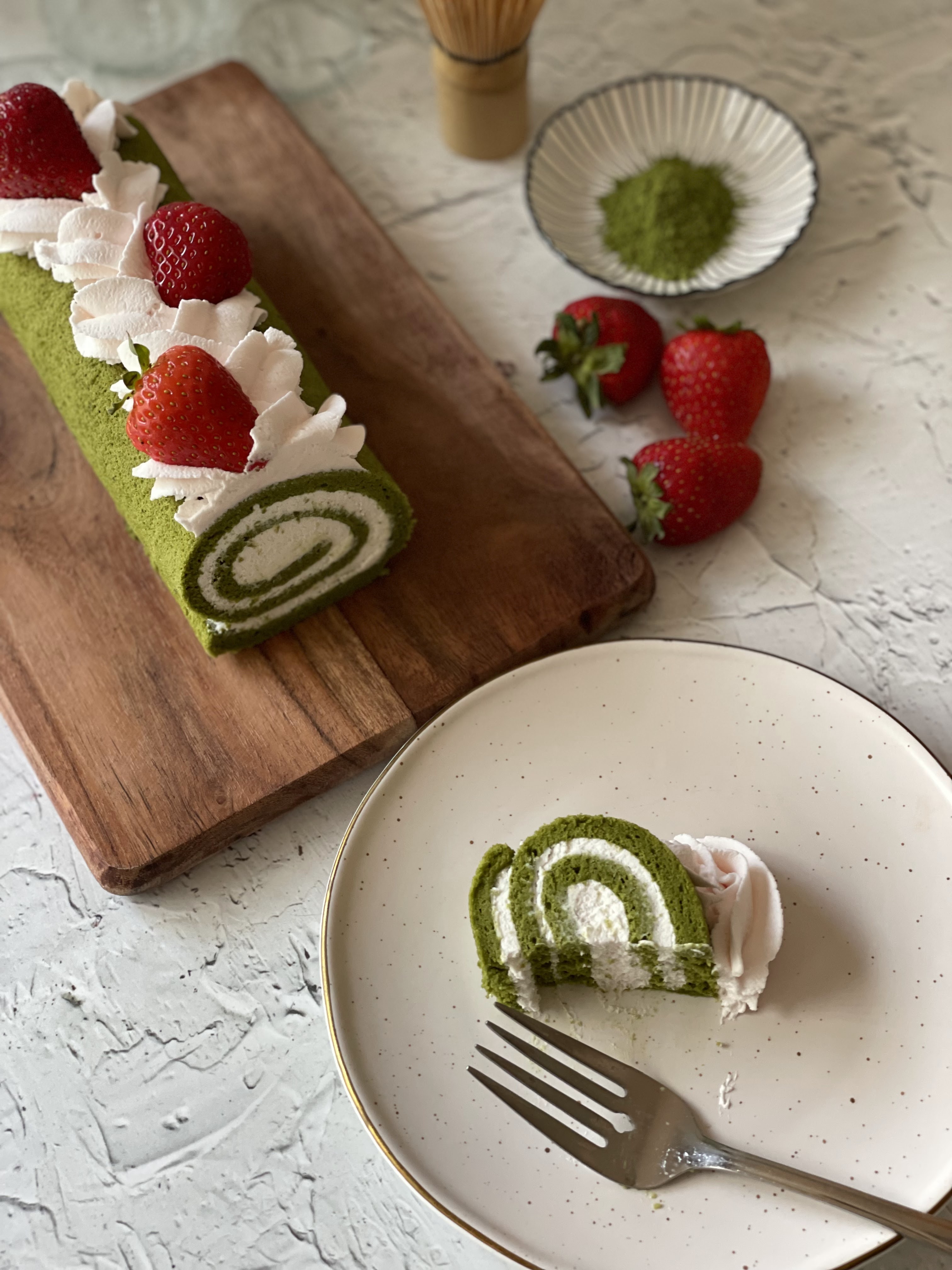 Matcha chiffon roll gluten free with strawberry whipped cream