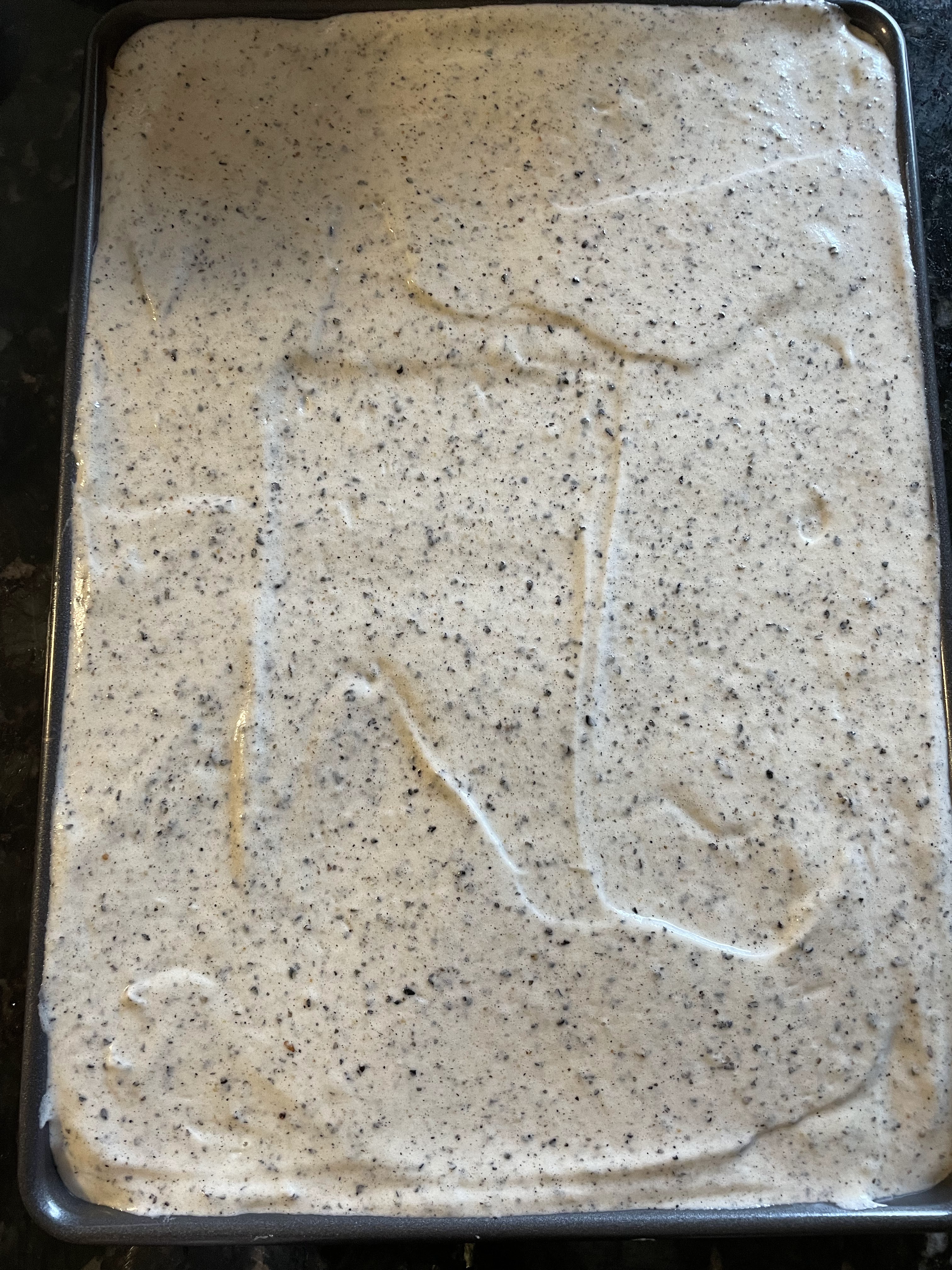 Gluten free black sesame roll with matcha glaze