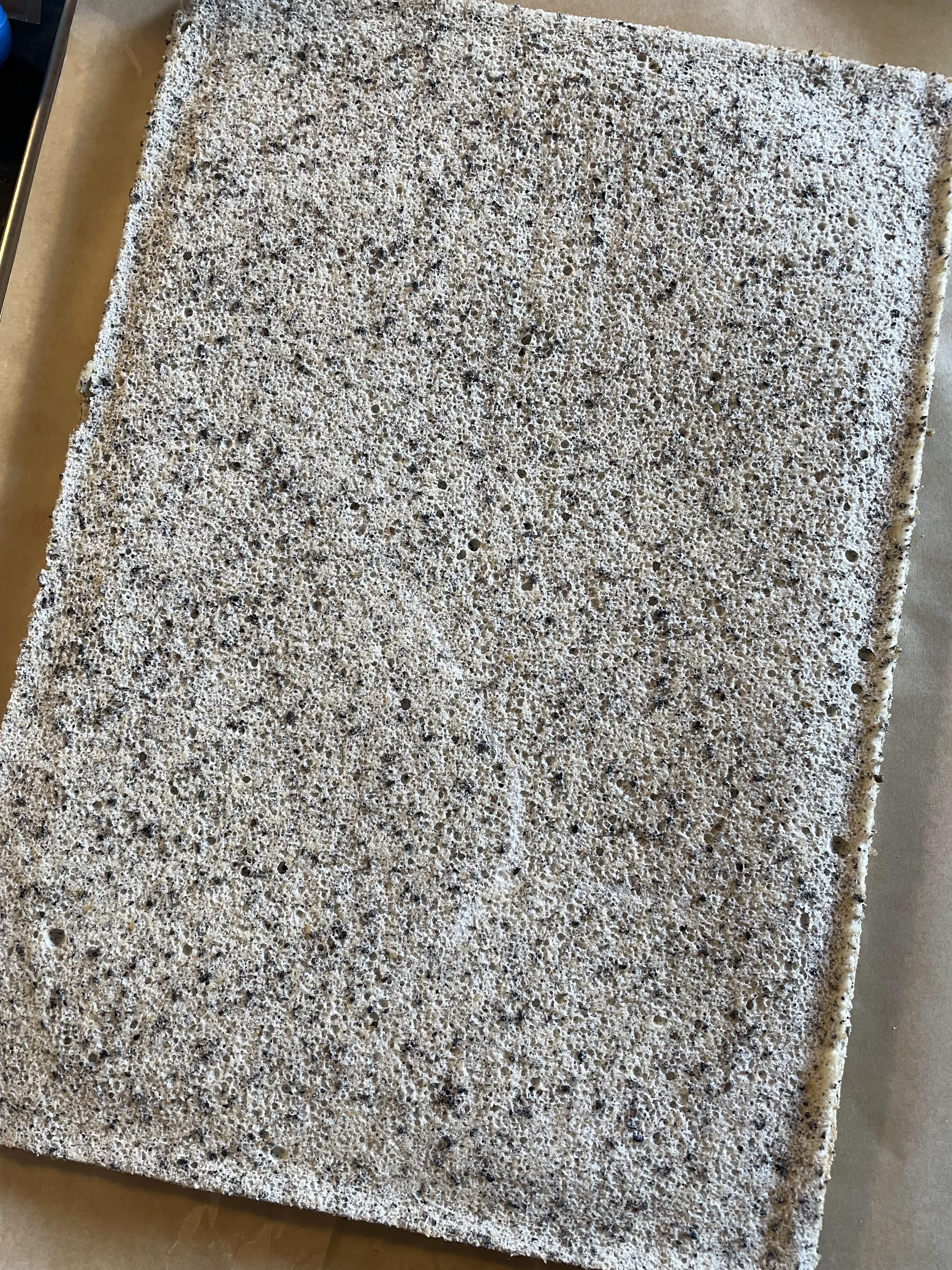 Gluten free black sesame roll with matcha glaze