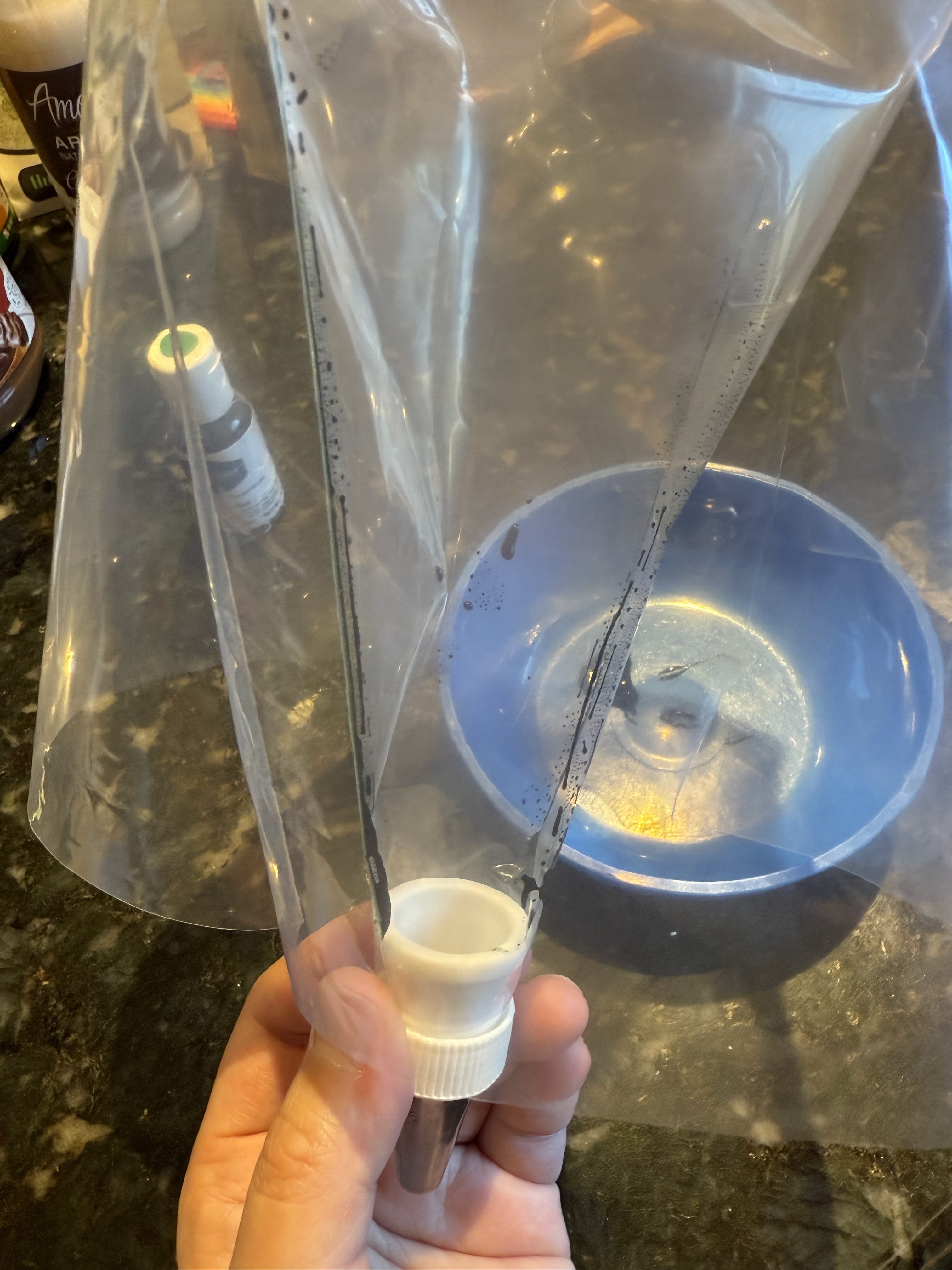 Paint the food coloring into the piping bag