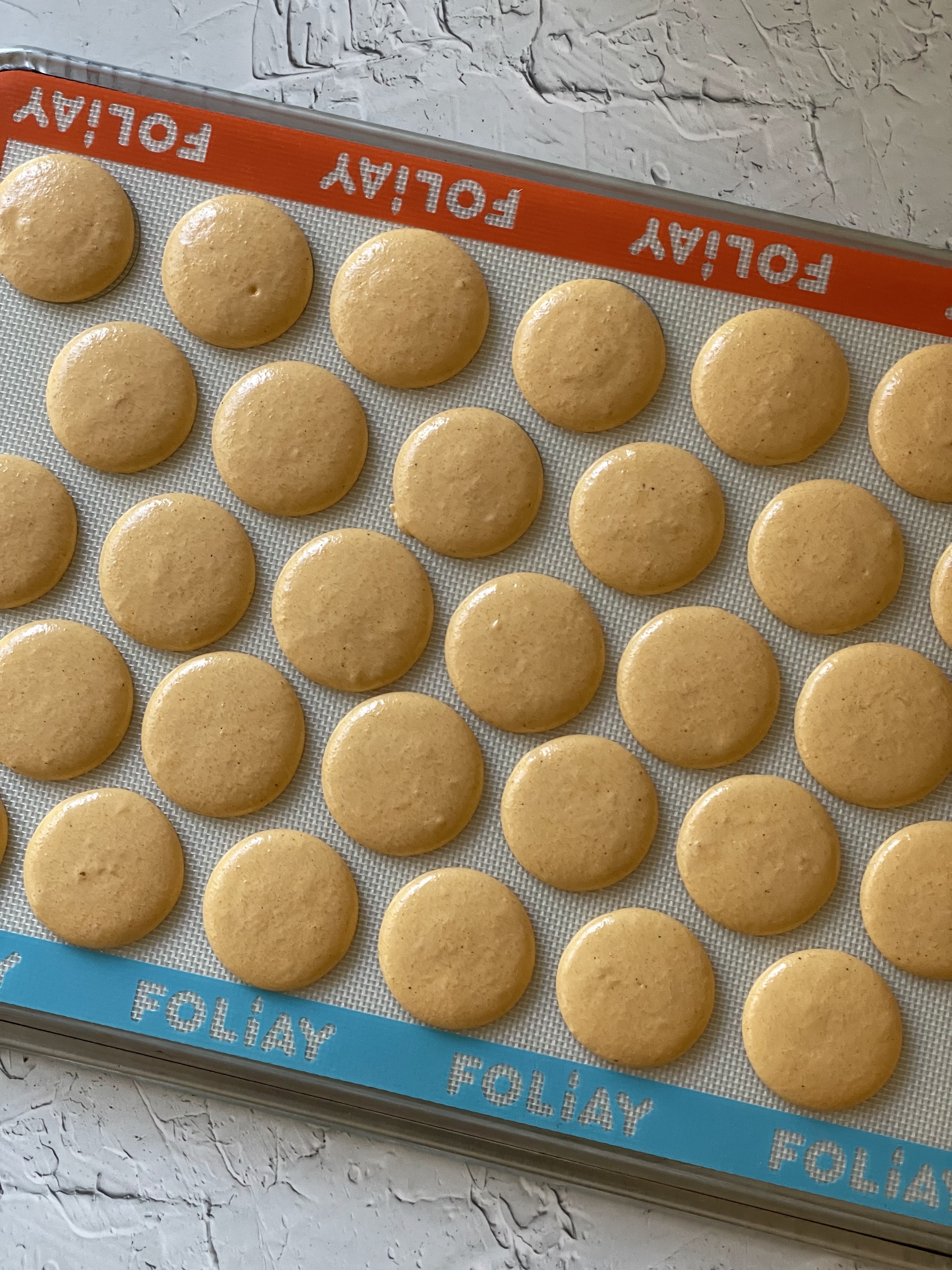 Pumpkin spice macaron shells