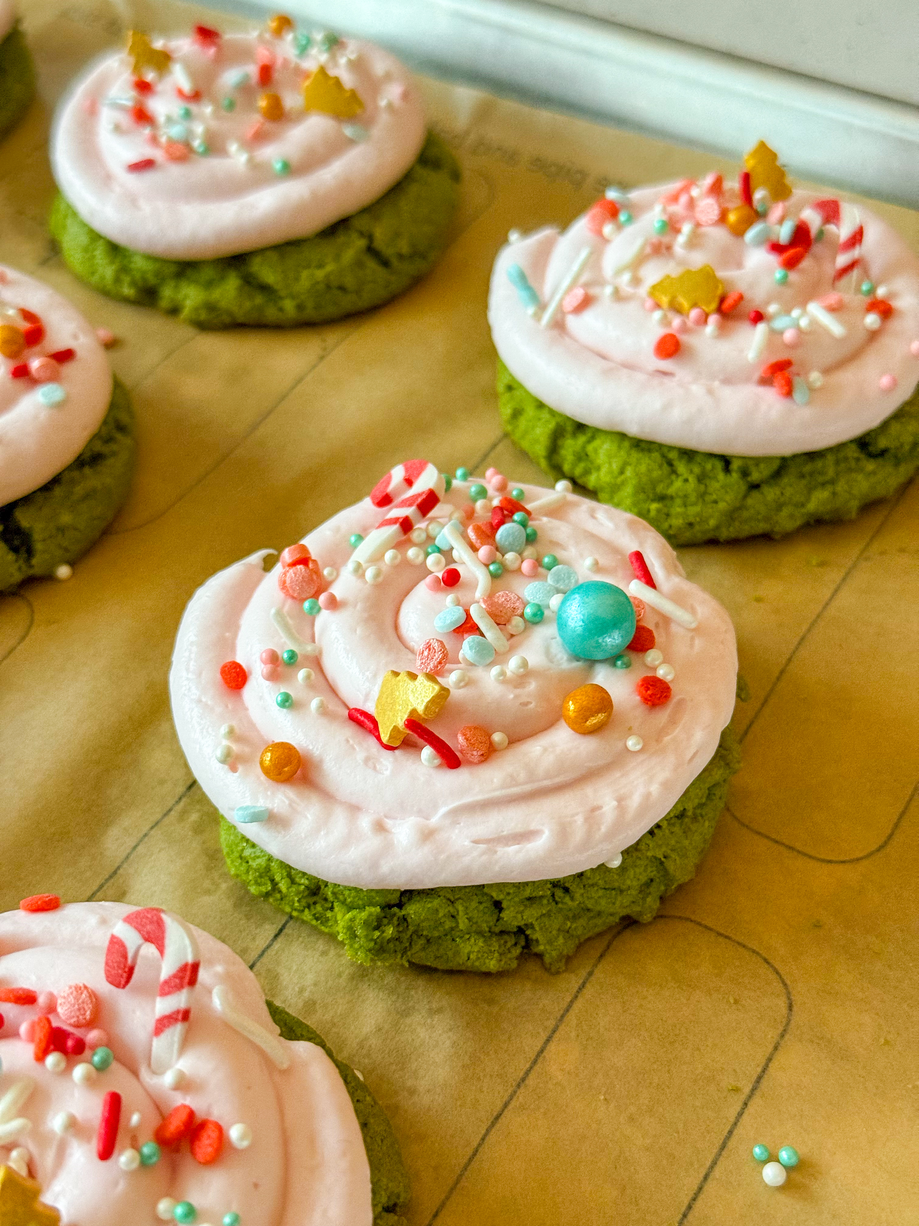 Gluten Free Matcha Latte Cookies with strawberry cream cheese frosting