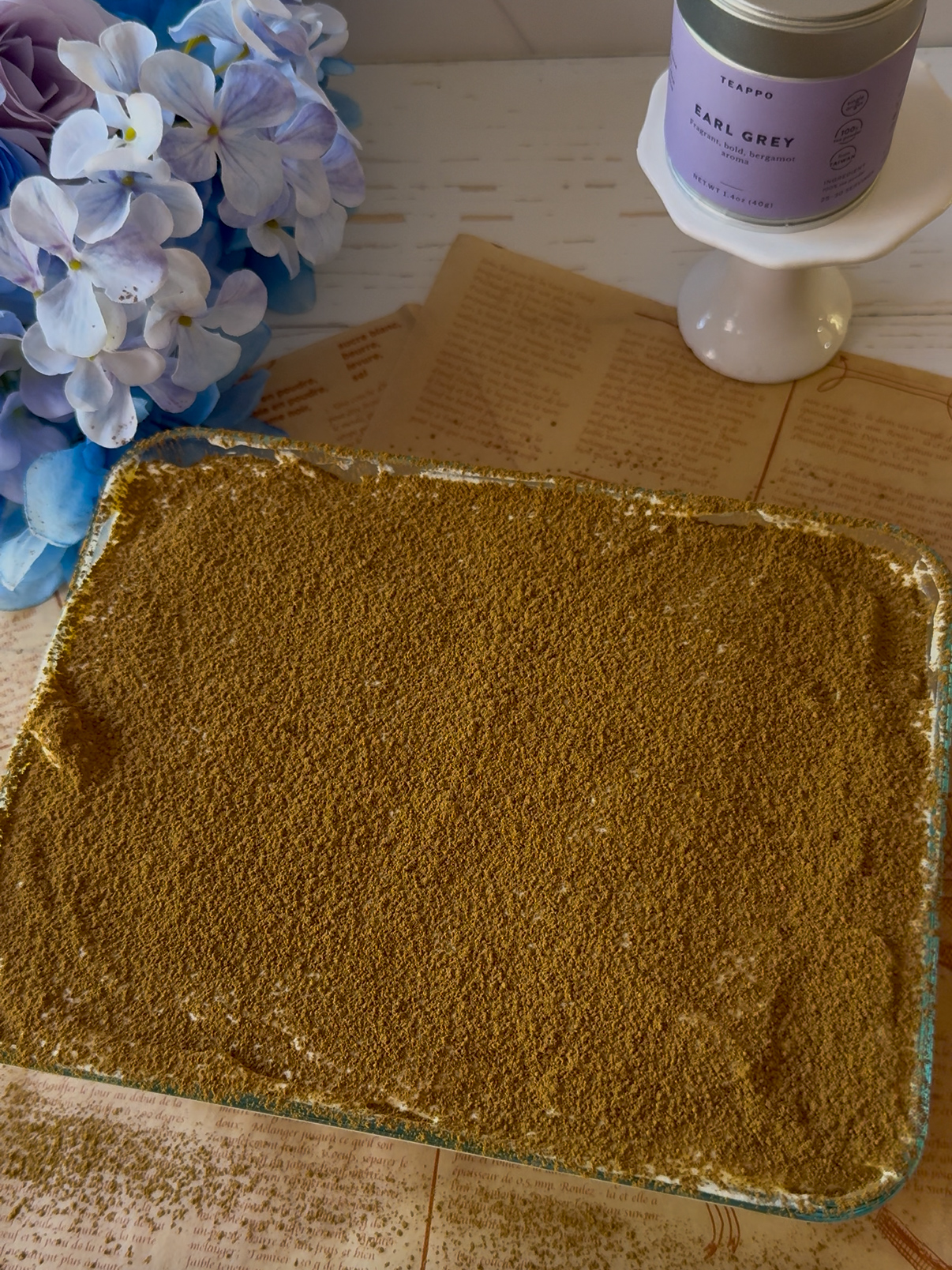 Sprinkle with earl grey tea powder on top